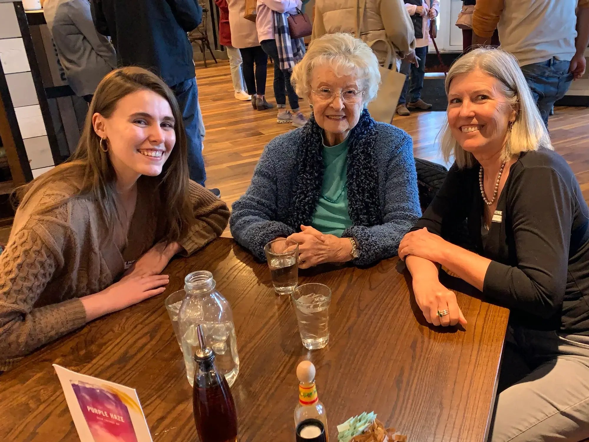 Seniors participating in an adult day program activity with structured support