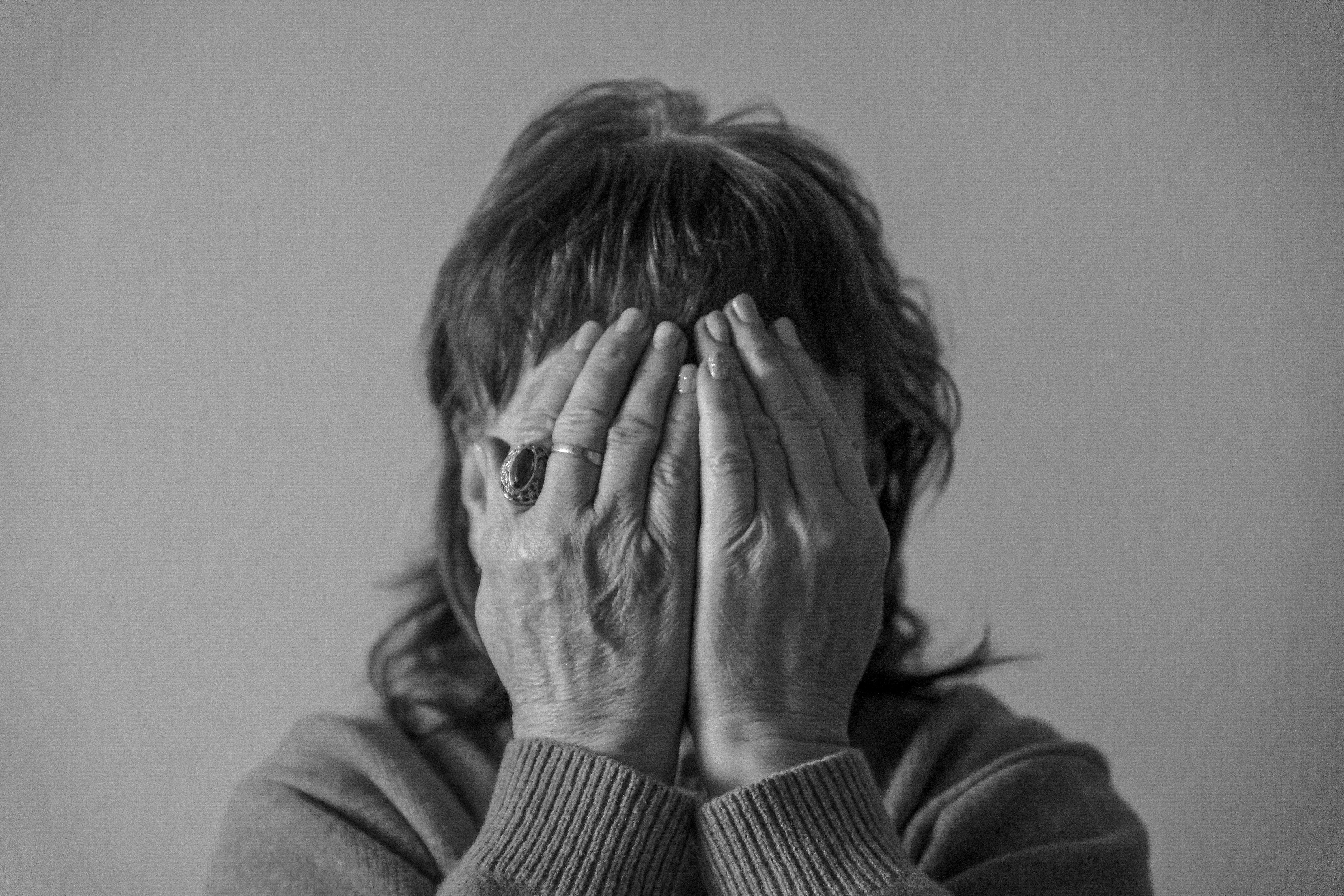 caregiver looking overwhelmed - Caregiver stress relief